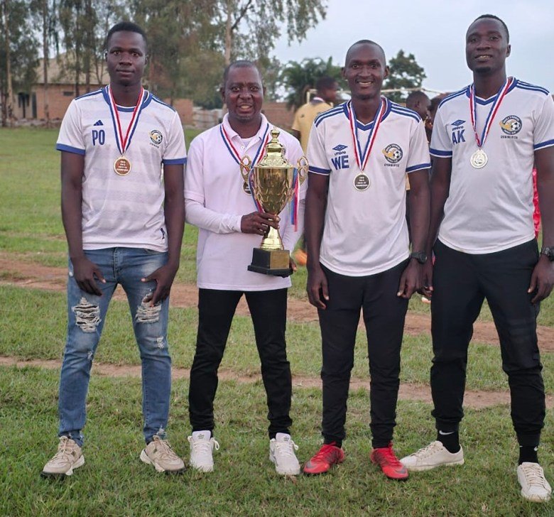 Adhola-Simbwori-officials-with-their-trophy-and-medals (1)